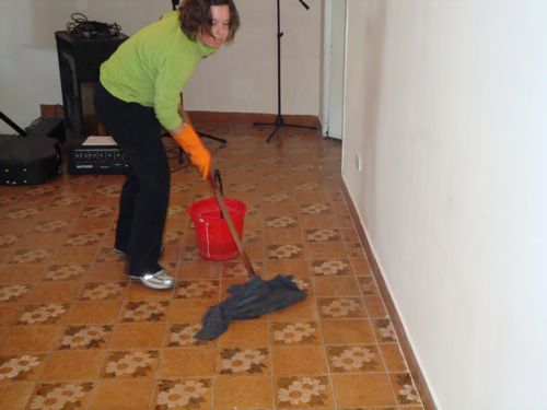 Demonstrating the Argentine method of mopping the floors.