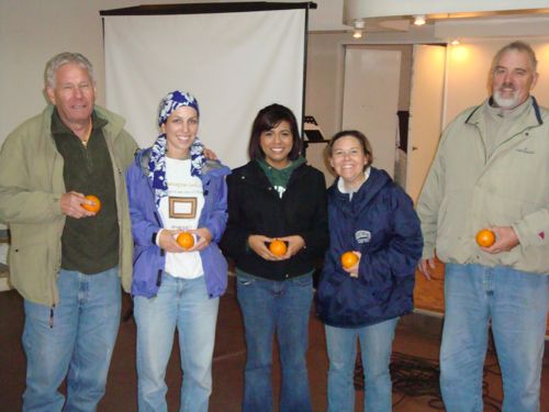 Back at the church, Kurt decided it would be fun to take group shot with our oranges.
